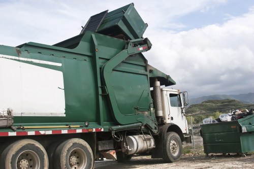Jims Rubbish collection truck in action
